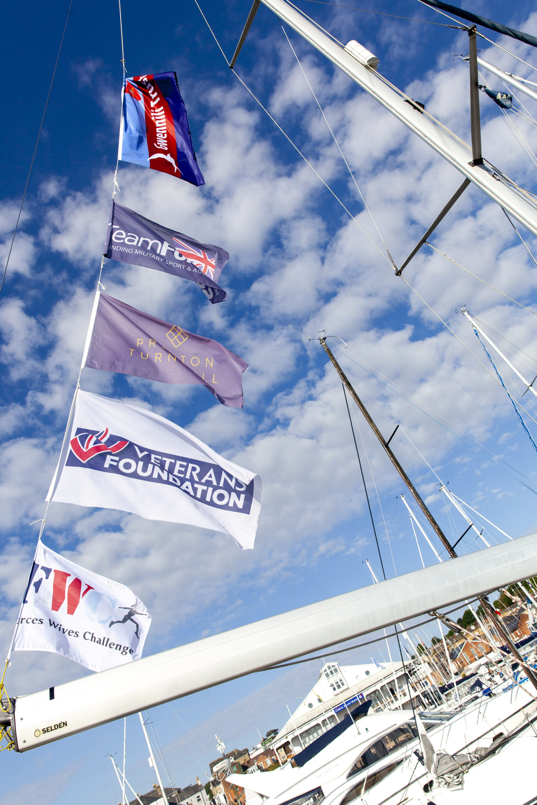 Partner flags flying from the rigging